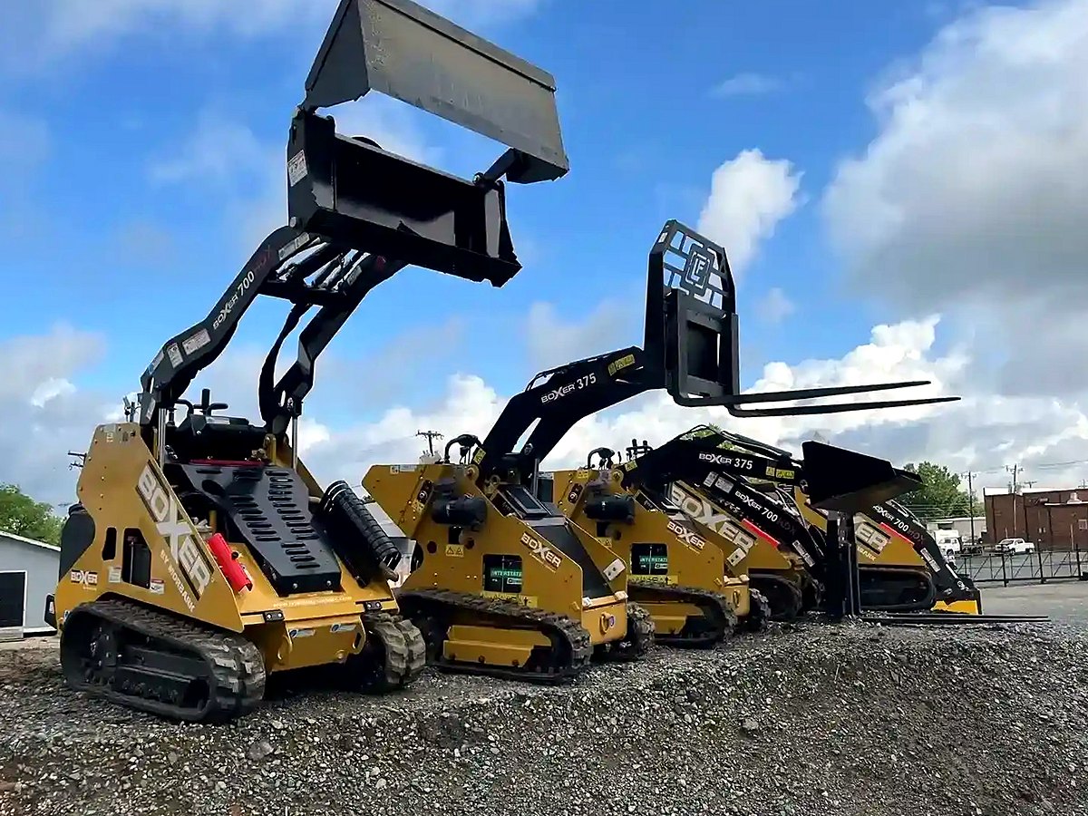 Row of Boxer 700HDX mini skid steers at the yard